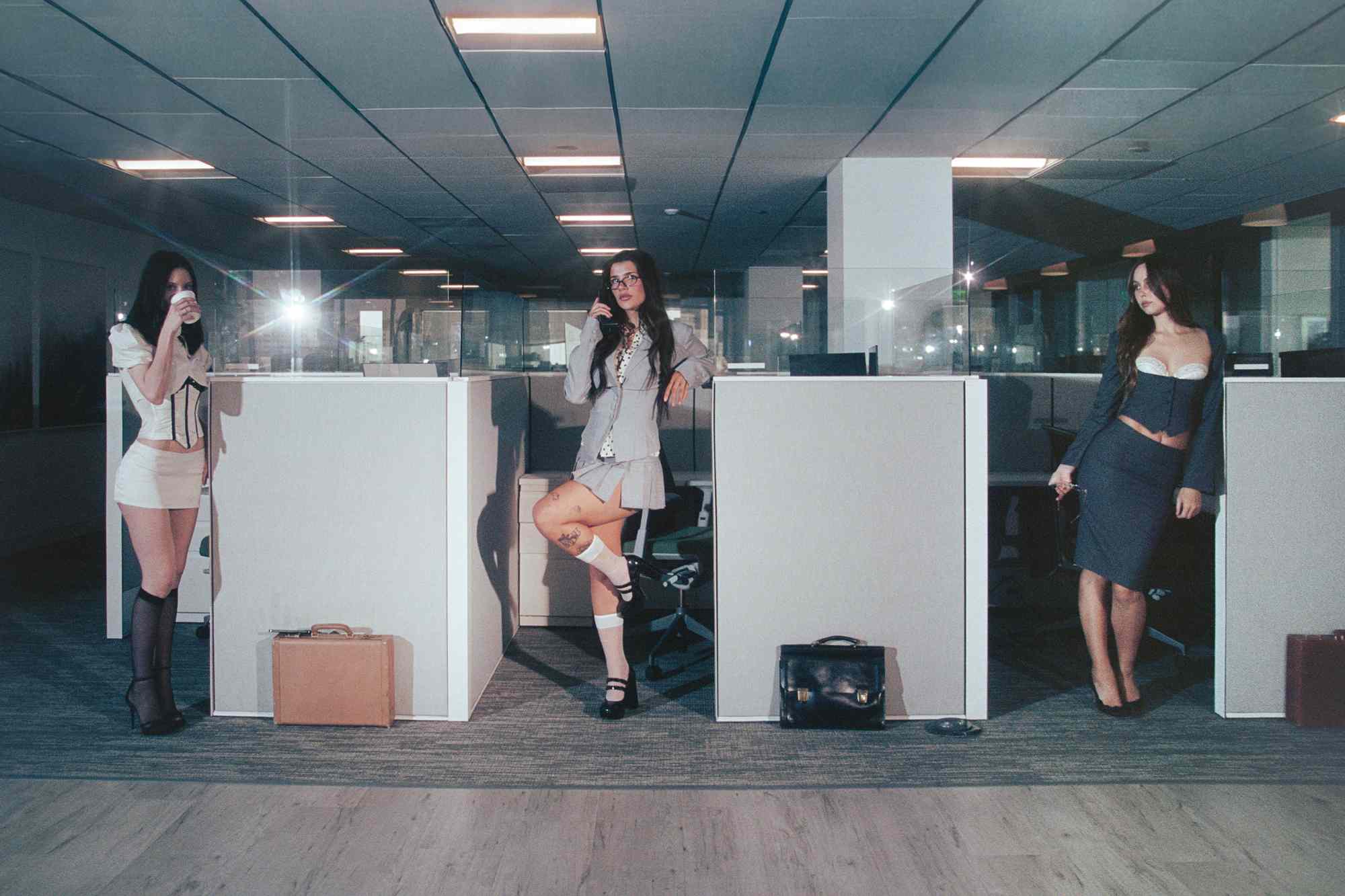 Ari Kytsya in an office set, photographed for People.